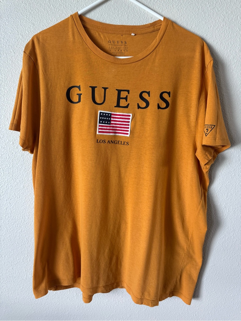 GUESS Men’s Mustard Orange Logo Tee with Flag Patch